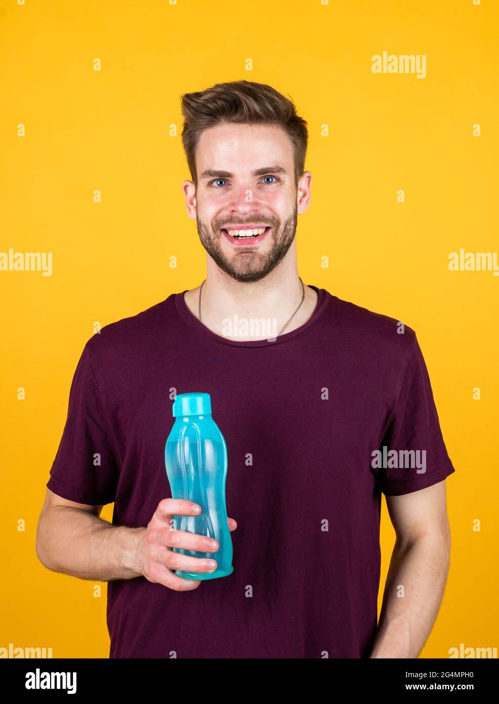 healthy lifestyle. keep water balance in body. hydration. handsome young man drink water Stock