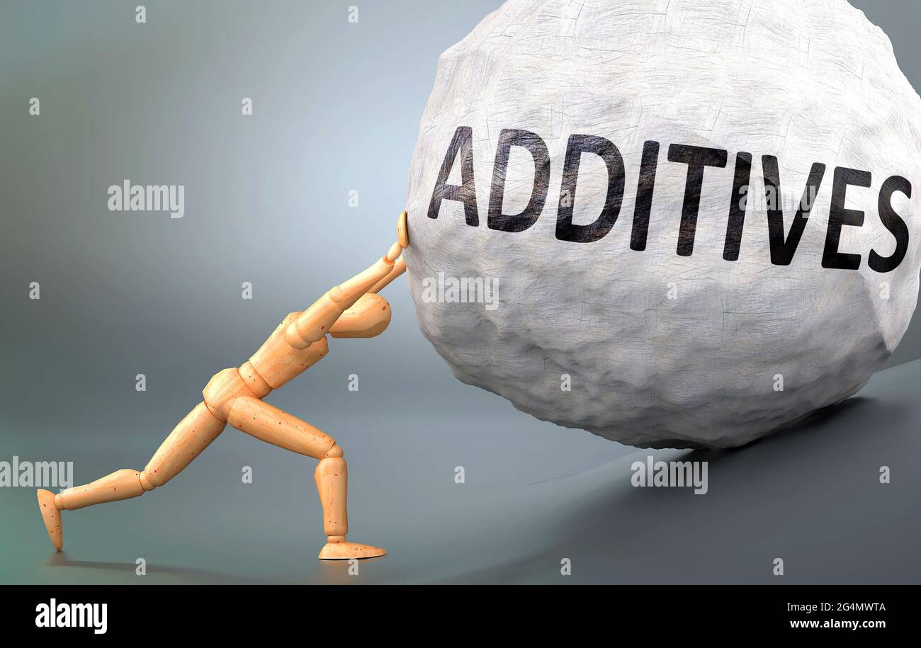 Additives and painful human condition, pictured as a wooden human figure pushing heavy weight to show how hard it can be to deal with Additives in hum Stock Photo