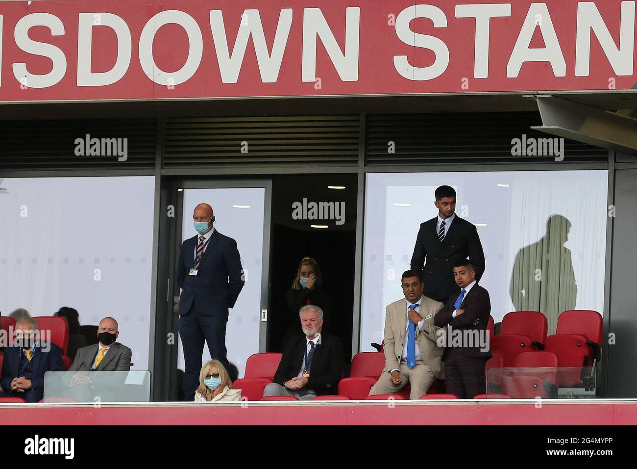 BRISTOL, UK JUNE 20TH Hartlepool United Chairman Raj Singh (seated Centre), his sons (standing right and centre) and former Middlesbrough, Manchester United and England footballer Gary Pallister look on from the directors box during the Vanarama National League Play Off Final between Hartlepool United and Torquay United at Ashton Gate, Bristol on Sunday 20th June 2021. (Credit: Mark Fletcher | MI News) Credit: MI News & Sport /Alamy Live News Stock Photo