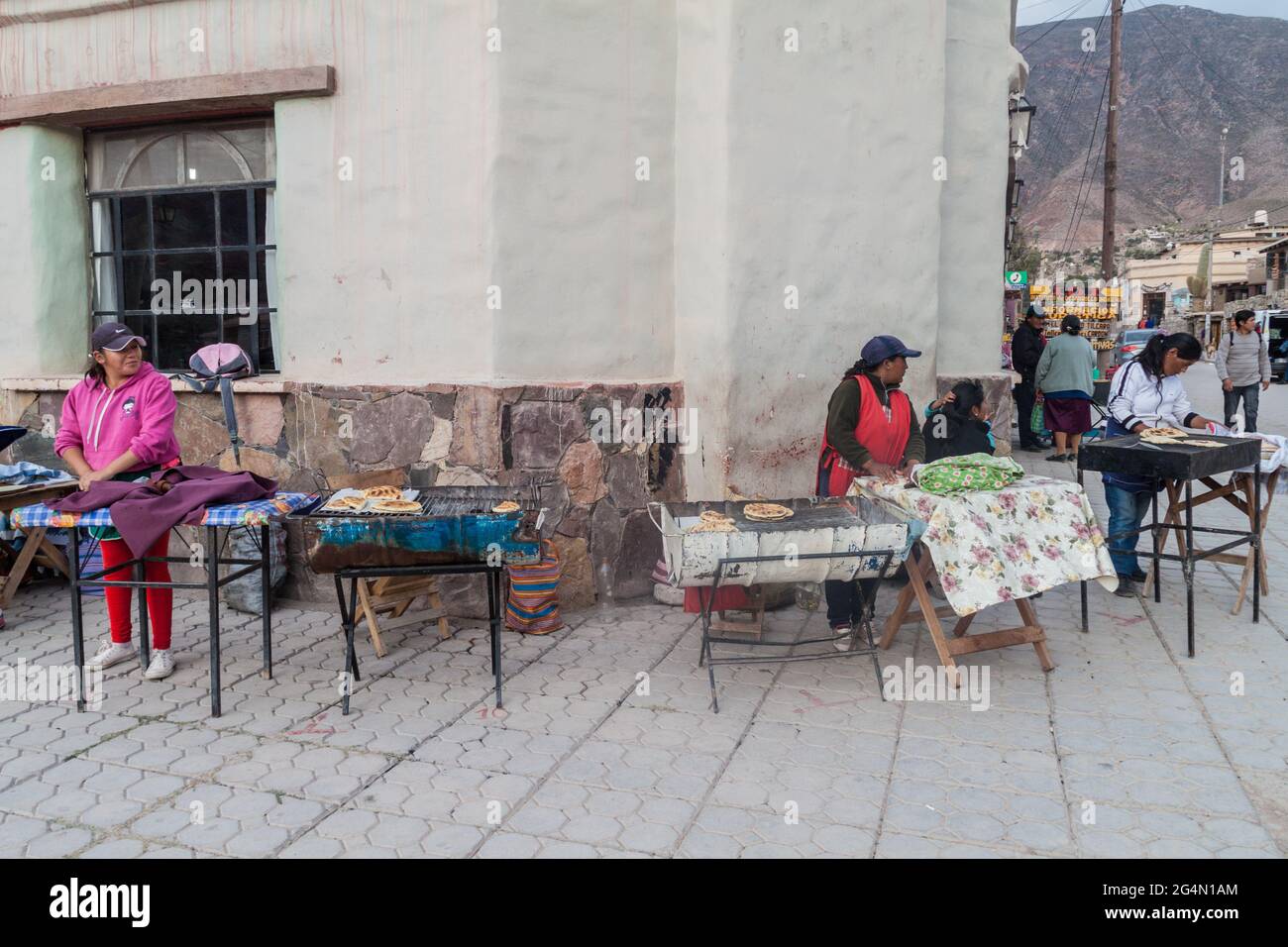 TILCARA, ARGENTINA  - APRIL 11, 2015: Street food sellers in Tilcara village. Stock Photo