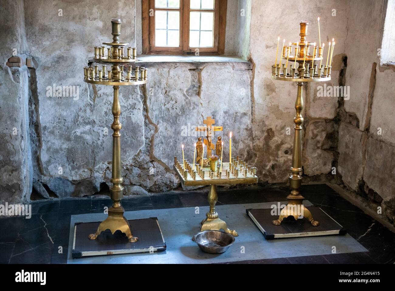 Orthodox church interior and candle stands in Sveta Nedelya Church Ossuary and Museum in Batak, Bulgaria, Balkans, Eastern Europe, EU Stock Photo
