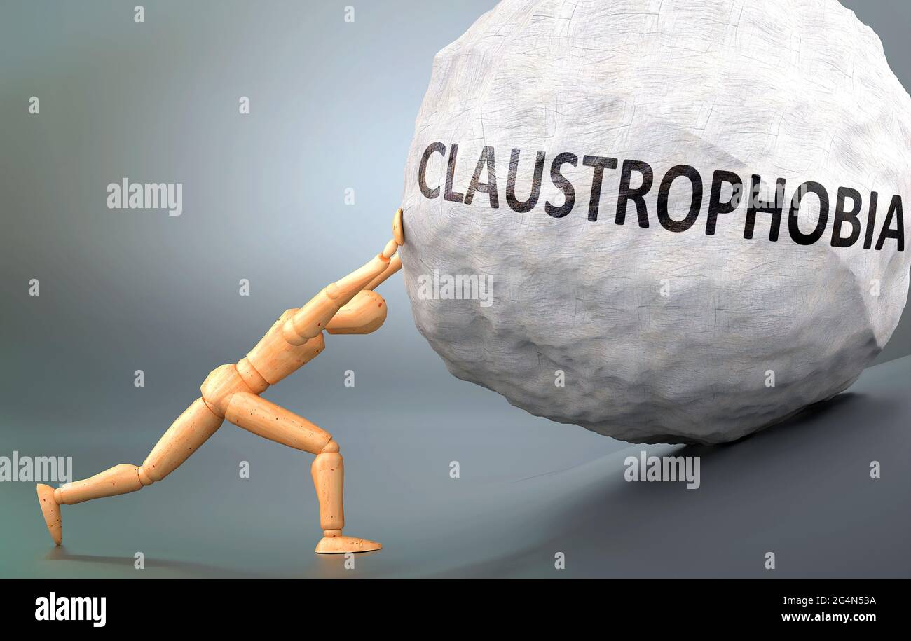 Claustrophobia and painful human condition, pictured as a wooden human figure pushing heavy weight to show how hard it can be to deal with Claustropho Stock Photo
