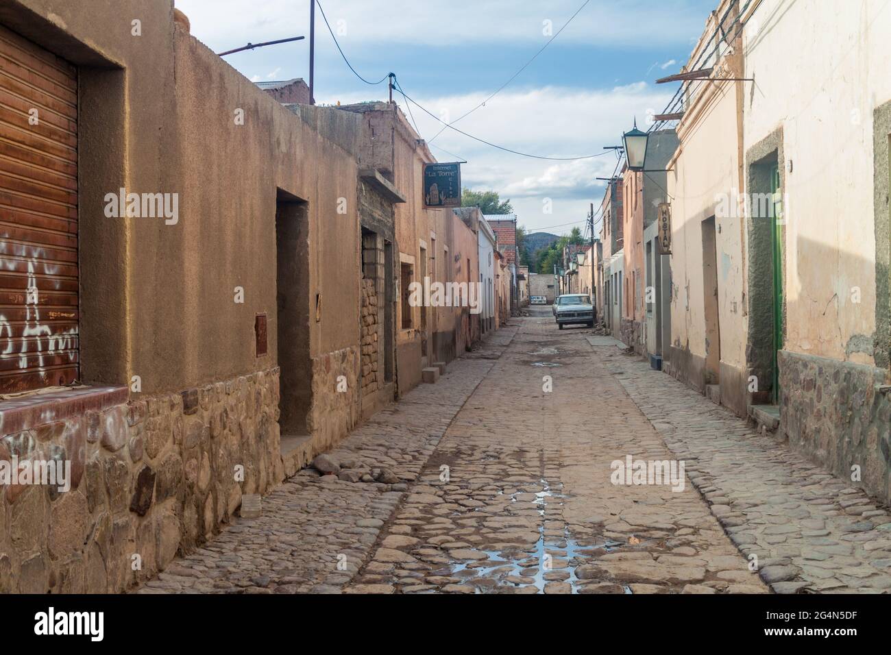 HUMAHUACA, ARGENTINA - APRIL 12, 2015: Cobbled street in Humahuaca village, Argentina Stock Photo