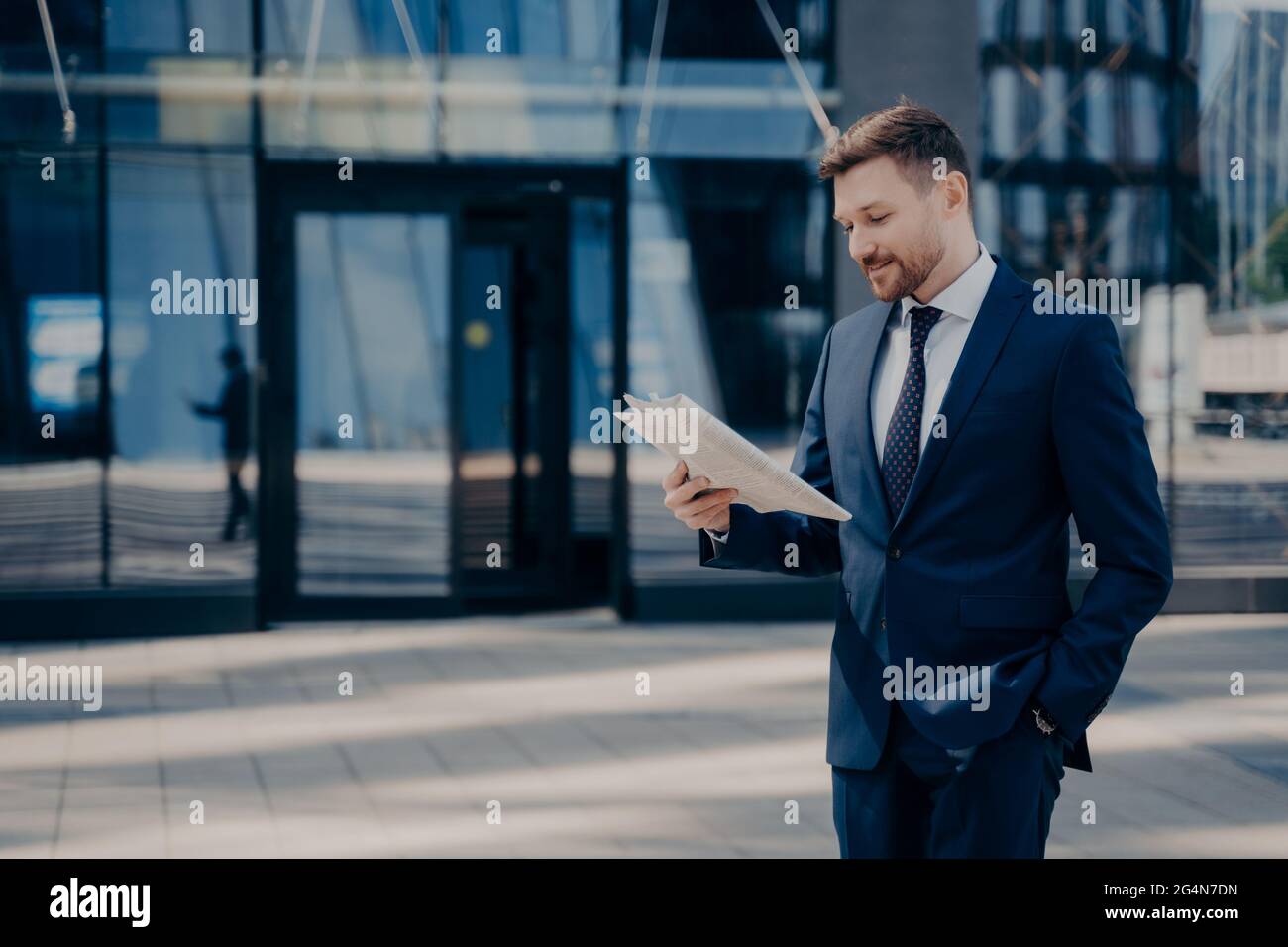 Male Lawyer Reading Newspaper While Walking To Firm Stock Photo Alamy