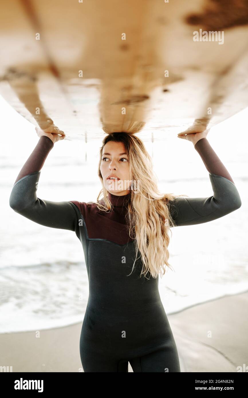 Surf woman wetsuit hi-res stock photography and images - Alamy