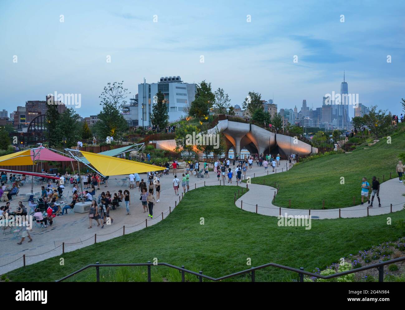New York City’s newest park “The Little Island” at Pier 55 in Manhattan opened recently. People are seen enjoying summer afternoon at the park. Stock Photo