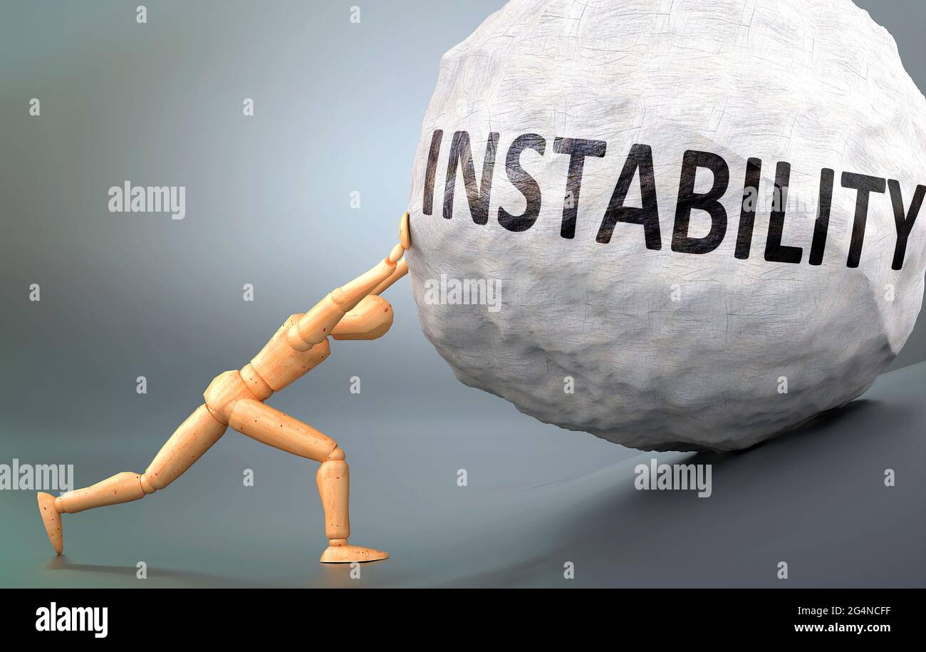 Instability and painful human condition, pictured as a wooden human figure pushing heavy weight to show how hard it can be to deal with Instability in Stock Photo
