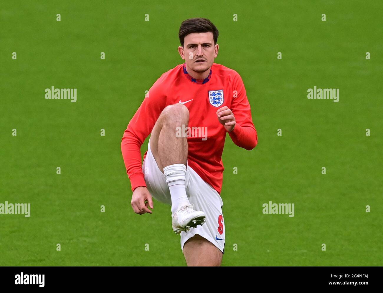 Soccer Football - Euro 2020 - Group D - Czech Republic v England - Wembley Stadium, London, Britain - June 22, 2021 England's Harry Maguire during the warm up before the match Pool via REUTERS/Neil Hall Stock Photo