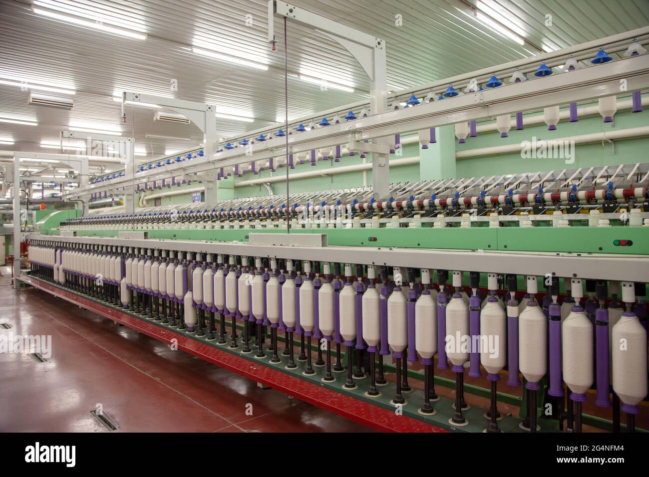 Cotton yarn production in a textile factory in Turkey Stock Photo