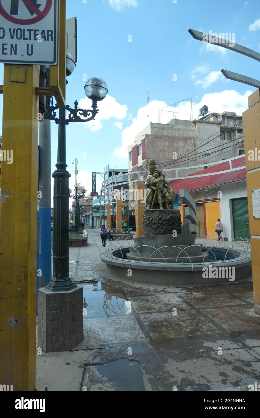 Road sign and Fountain in Peru with street light Stock Photo - Alamy