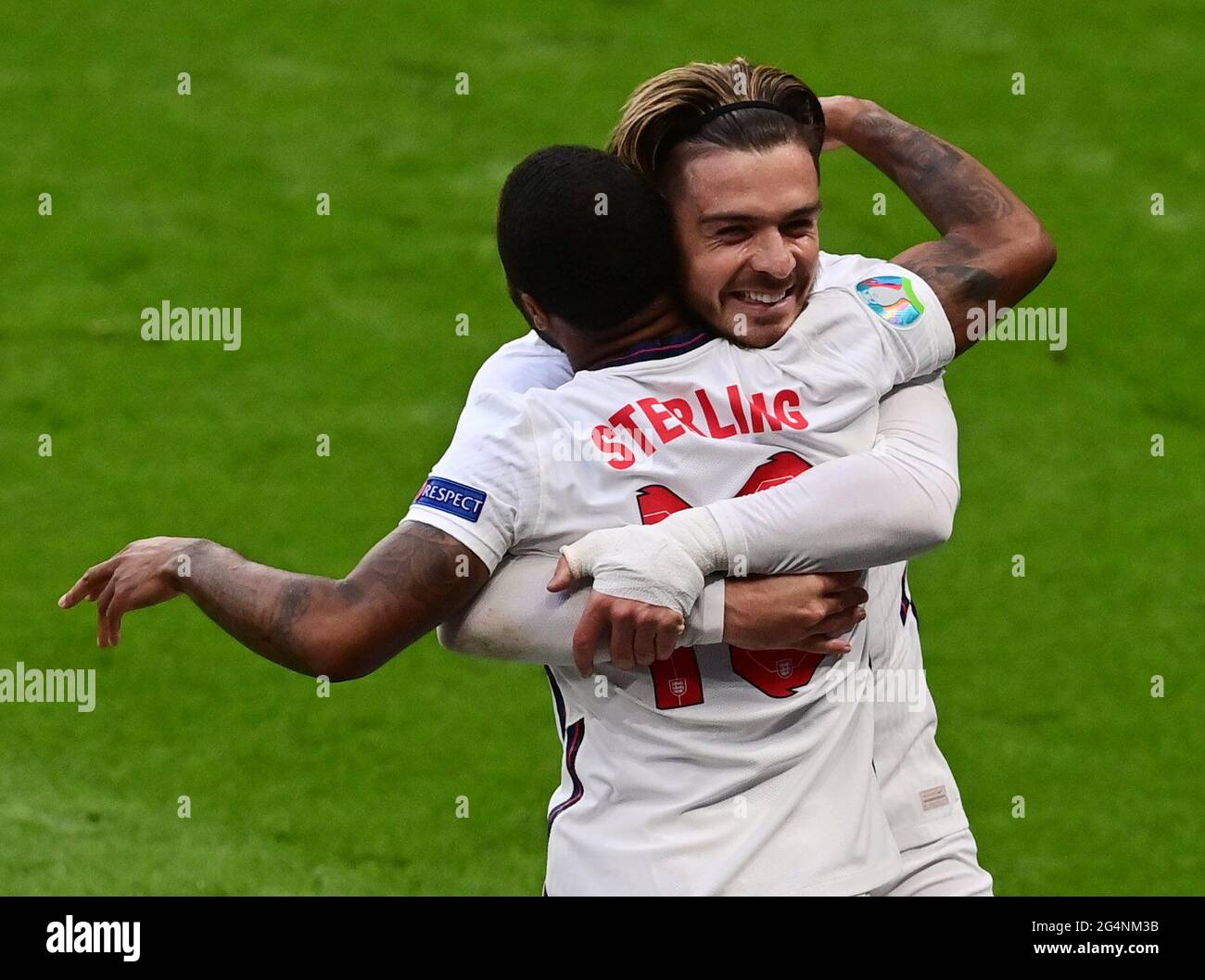 Soccer Football - Euro 2020 - Group D - Czech Republic v England - Wembley Stadium, London, Britain - June 22, 2021 England's Raheem Sterling celebrates scoring their first goal with Jack Grealish Pool via REUTERS/Neil Hall Stock Photo