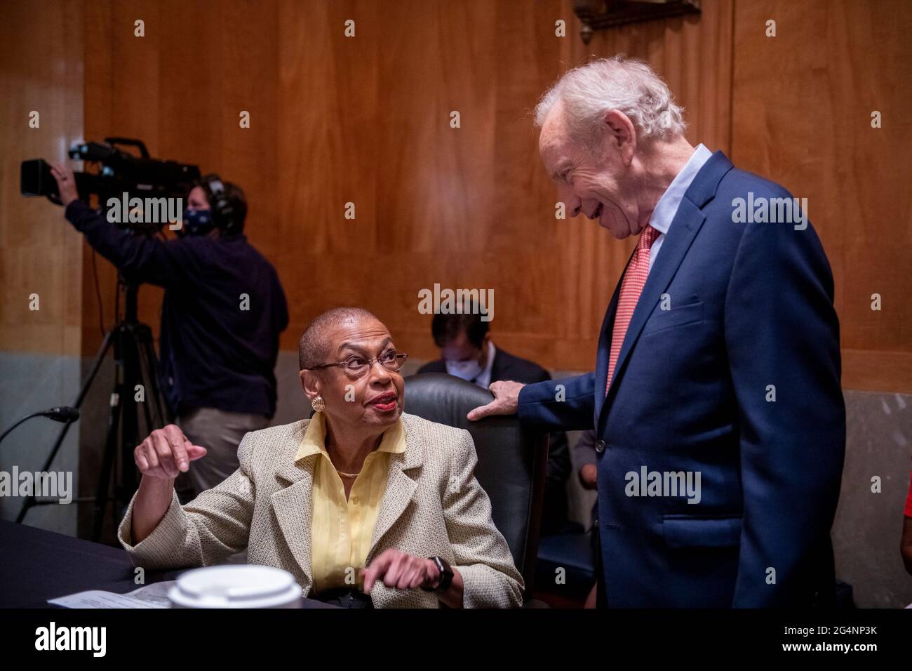 Former United States Senator Joseph I. Lieberman (Independent of Connecticut), right, is greeted by Delegate Eleanor Holmes Norton (Democrat of the District of Columbia) as they arrive for a Senate Committee on Homeland Security and Governmental Affairs hearing to examine D.C. statehood, in the Dirksen Senate Office Building in Washington, DC, Tuesday, June 22, 2021. Credit: Rod Lamkey/CNP /MediaPunch Stock Photo
