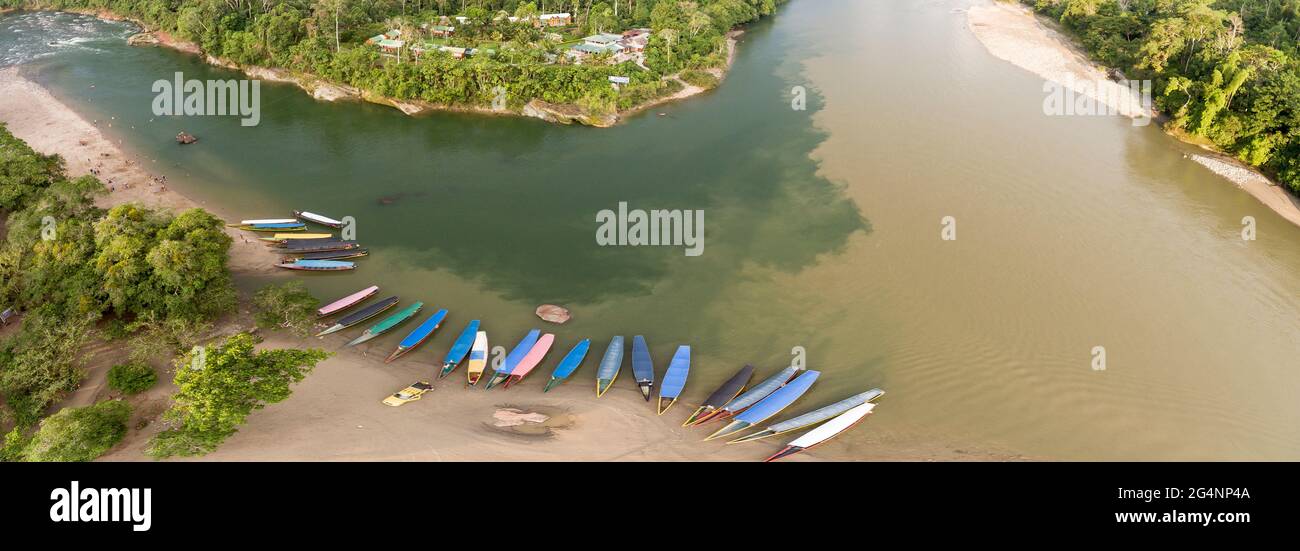 Aerial of passenger canoes on the beach at Misahualli village, a popular destination for adventure tourism in the Ecuadorian Amazon. The clear water R Stock Photo