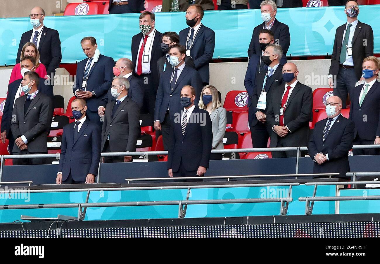 The Duke of Cambridge (centre) and UEFA President Aleksander Ceferin (left) in the stands before the UEFA Euro 2020 Group D match at Wembley Stadium, London. Picture date: Tuesday June 22, 2021. Stock Photo