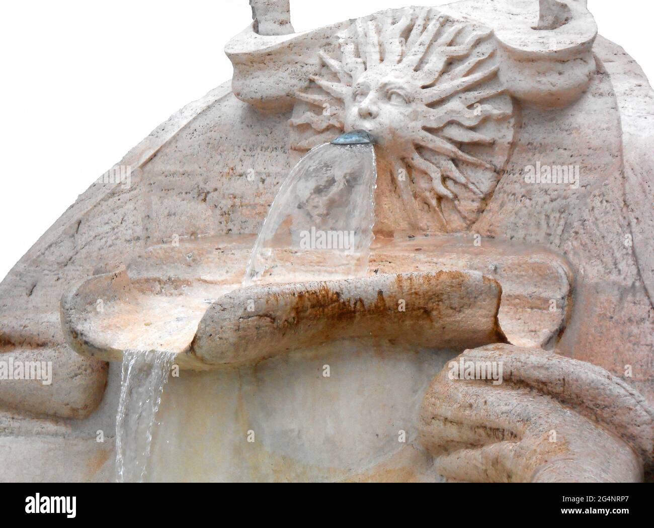 Isolated detail of the sun on the Fontana della Barcaccia at the foot of the Spanish Steps in Rome's Piazza di Spagna. It is a Baroque-style fountain Stock Photo