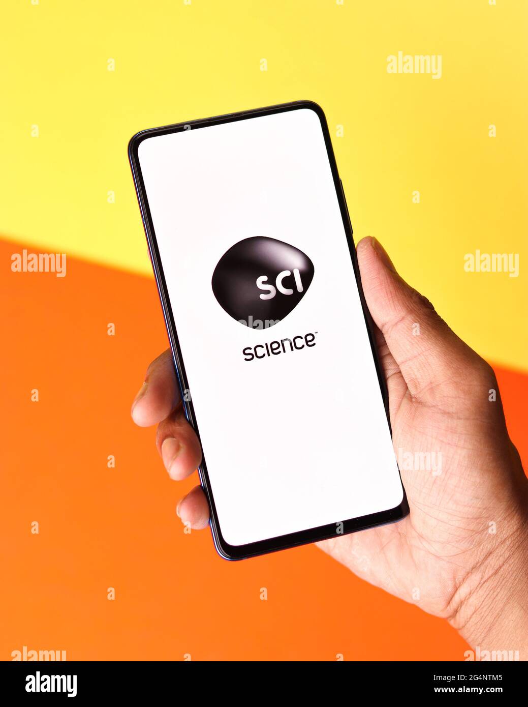 Discovery science logo on phone screen stock image. Stock Photo