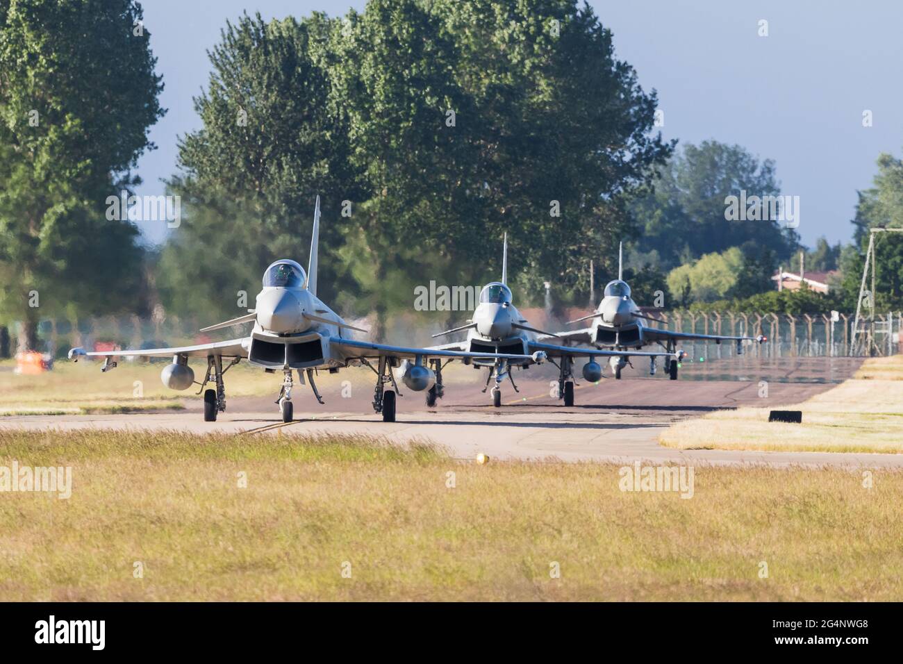 Three Eurofighter Typhoons taxiing out for a training sortie at RAF Coningsby pictured in June 2021. Stock Photo