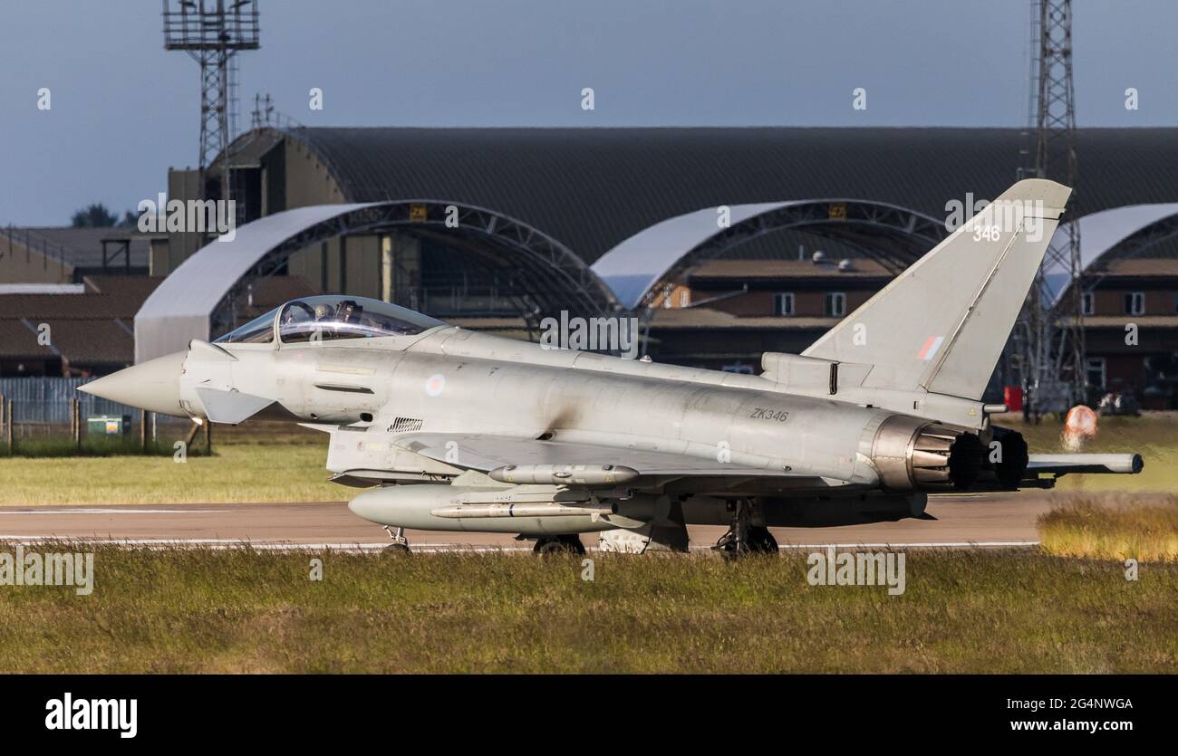 RAF Typhoon taxis to the runway at Coningsby (Lincolnshire) air base for a training sortie in June 2021. Stock Photo