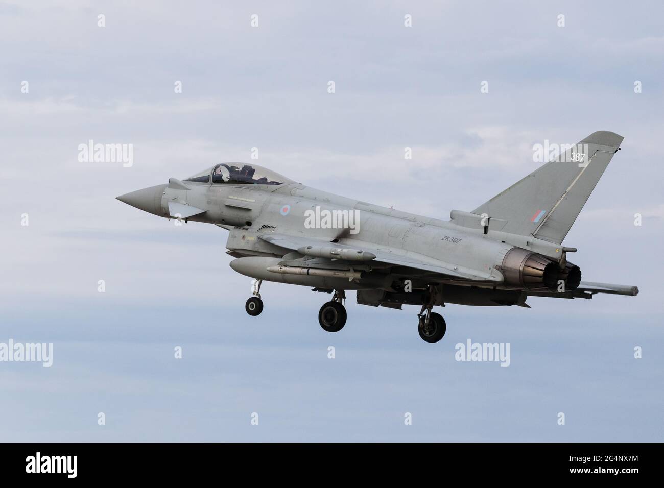 An RAF Typhoon coming into land in June 2021 at Royal Air Force Coningsby in Lincolnshire after a training sortie. Stock Photo