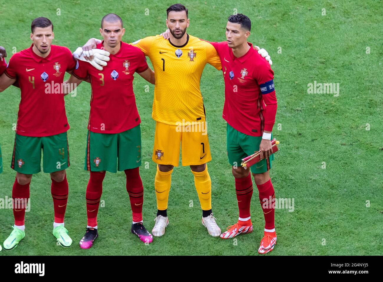 Munich, Germany. 19th June, 2021. Ruben Dias, Pepe, Rui Patricio and Cristiano Ronaldo are singing the national anthem during the UEFA EURO 2020 Championship Group F match between Portugal and Germany at Football Arena Munich. (Final score; Portugal 2:4 Germany) Credit: SOPA Images Limited/Alamy Live News Stock Photo