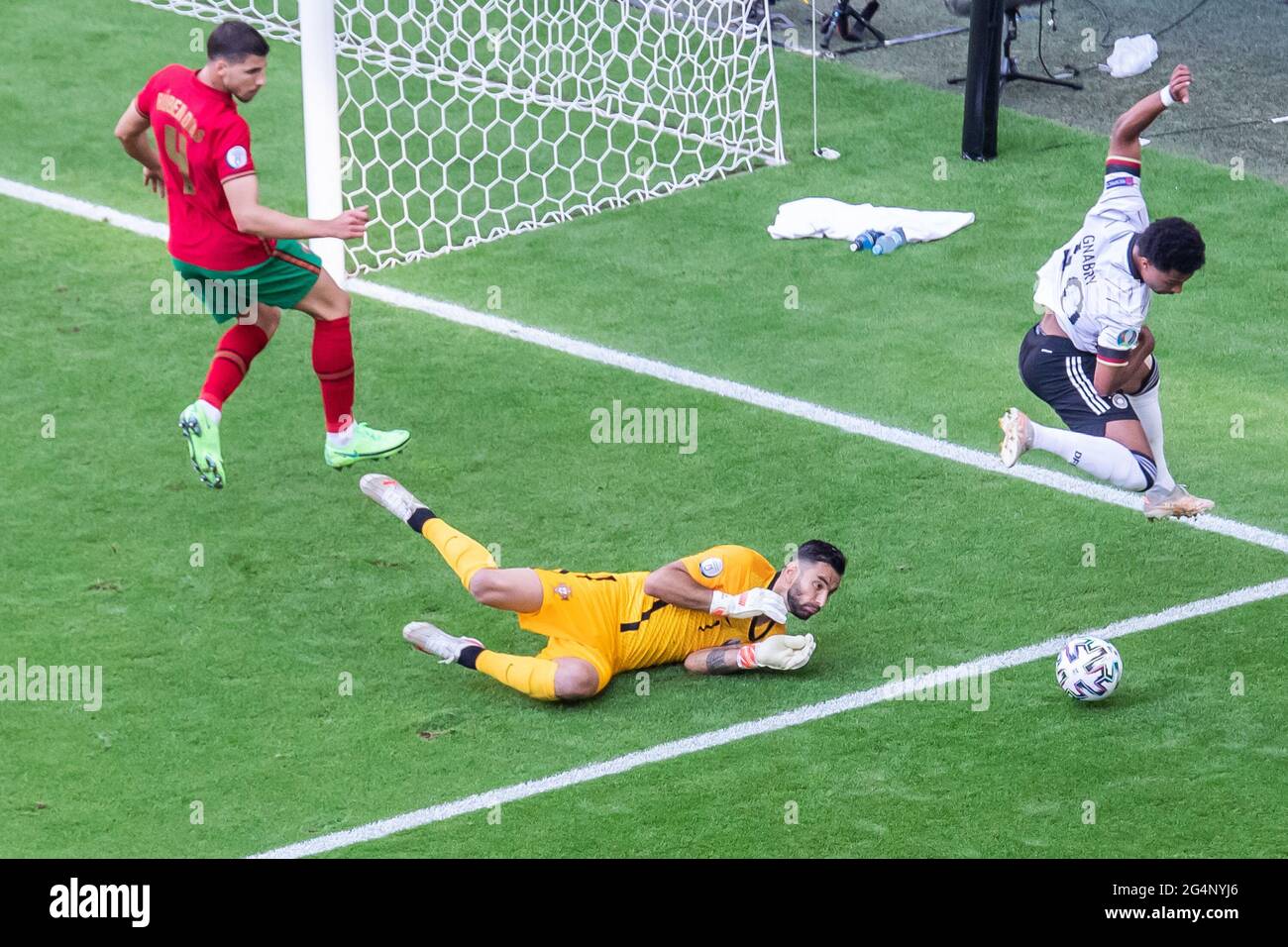 Munich, Germany. 19th June, 2021. Ruben Dias, Rui Patricio of Portugal and Serge Gnabry of Germany are seen in action during the UEFA EURO 2020 Championship Group F match between Portugal and Germany at Football Arena Munich. (Final score; Portugal 2:4 Germany) Credit: SOPA Images Limited/Alamy Live News Stock Photo