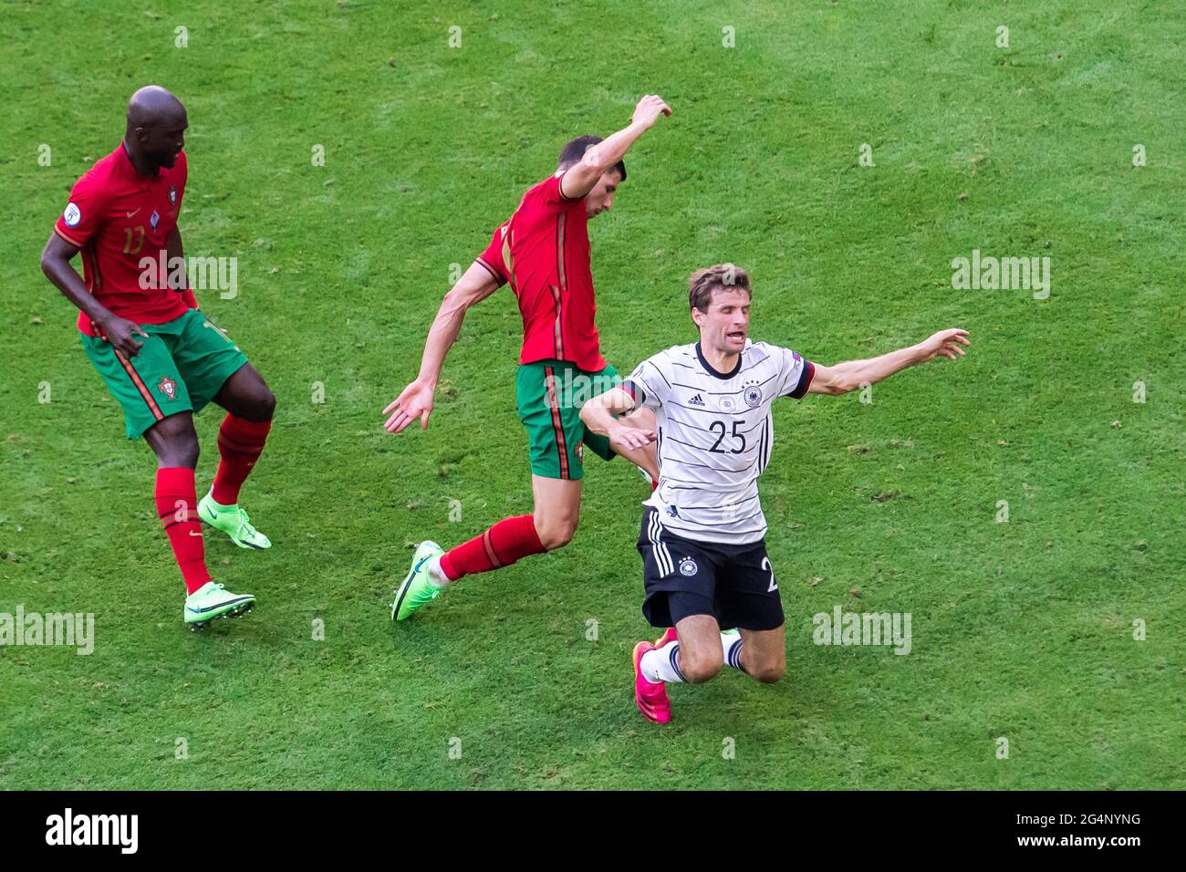 Munich, Germany. 19th June, 2021. William Carvalho, Ruben Dias of Portugal and Thomas Muller of Germany are seen in action during the UEFA EURO 2020 Championship Group F match between Portugal and Germany at Football Arena Munich. (Final score; Portugal 2:4 Germany) Credit: SOPA Images Limited/Alamy Live News Stock Photo