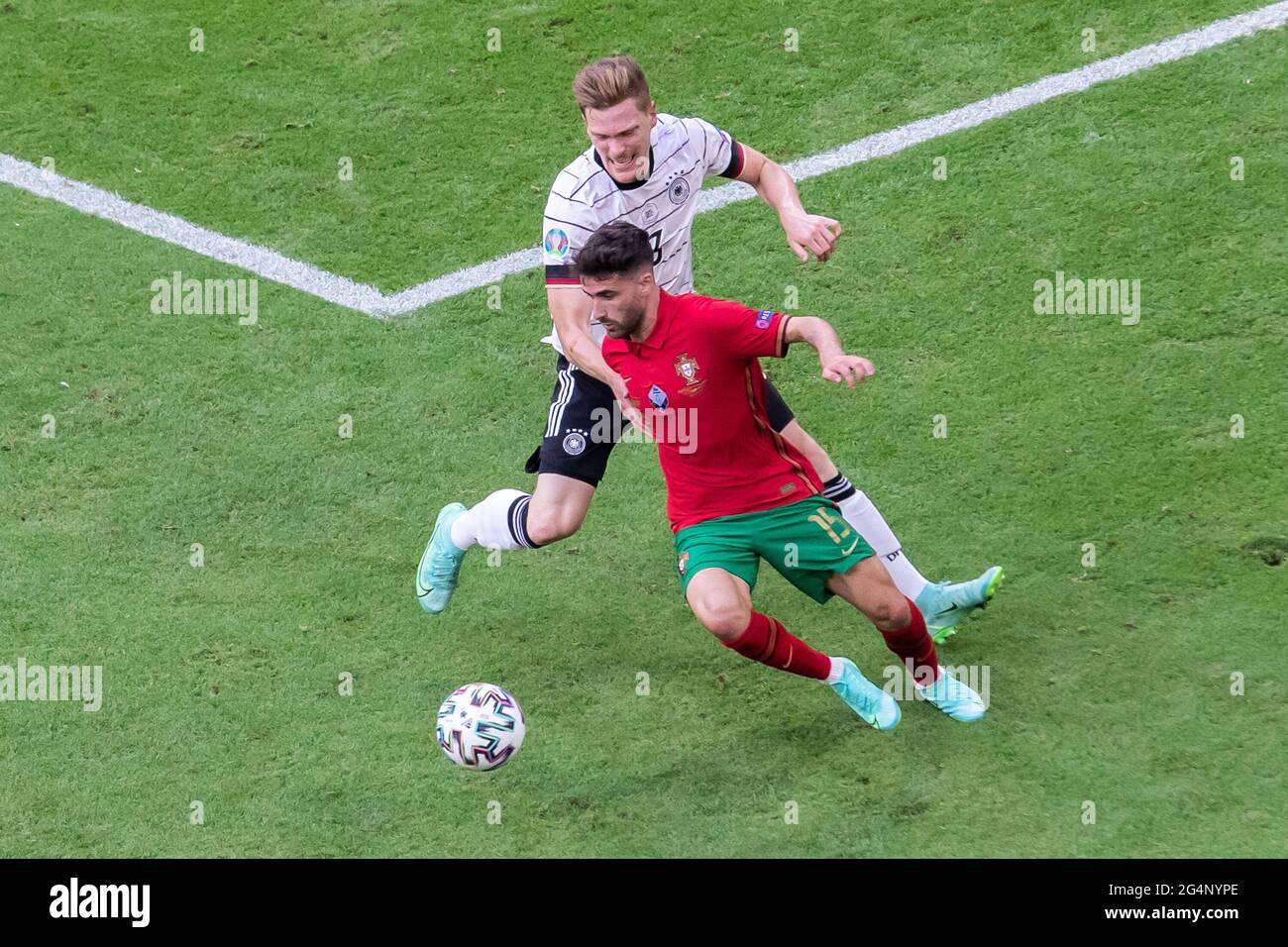Munich, Germany. 19th June, 2021. Marcel Halstenberg of Germany and Rafa Silva of Portugal are seen in action during the UEFA EURO 2020 Championship Group F match between Portugal and Germany at Football Arena Munich. (Final score; Portugal 2:4 Germany) Credit: SOPA Images Limited/Alamy Live News Stock Photo