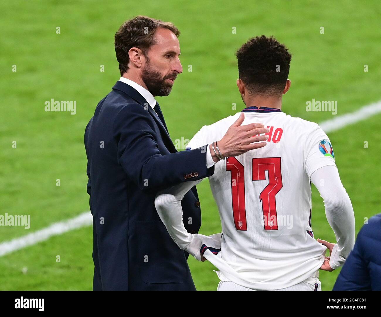 Soccer Football - Euro 2020 - Group D - Czech Republic v England - Wembley Stadium, London, Britain - June 22, 2021 England's Jadon Sancho with manager Gareth Southgate as he gets ready to come on as a substitute Pool via REUTERS/Neil Hall Stock Photo