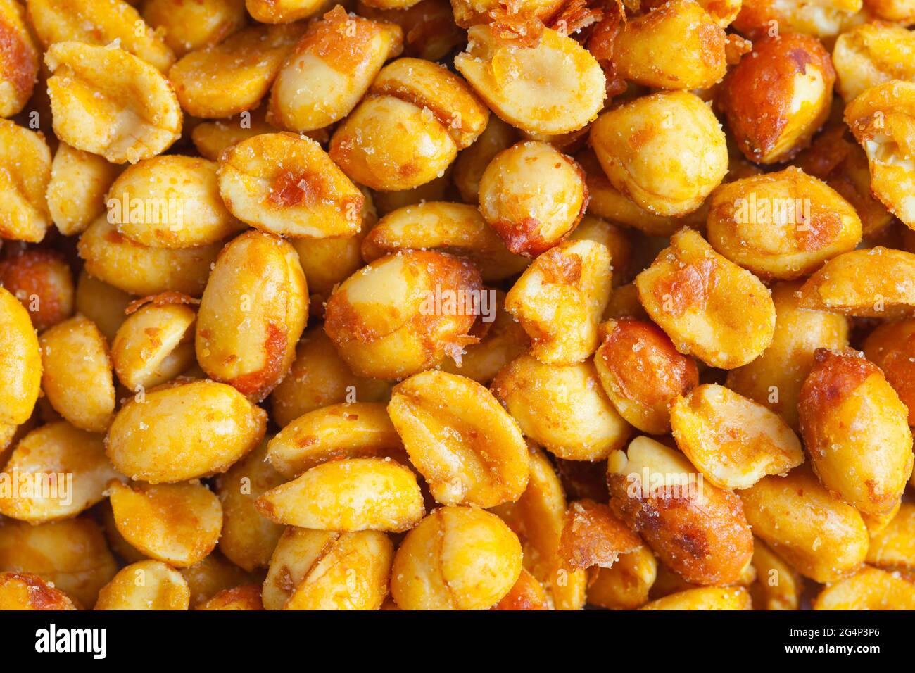 Pile of Honey Roasted Peanuts Background Texture. Stock Photo