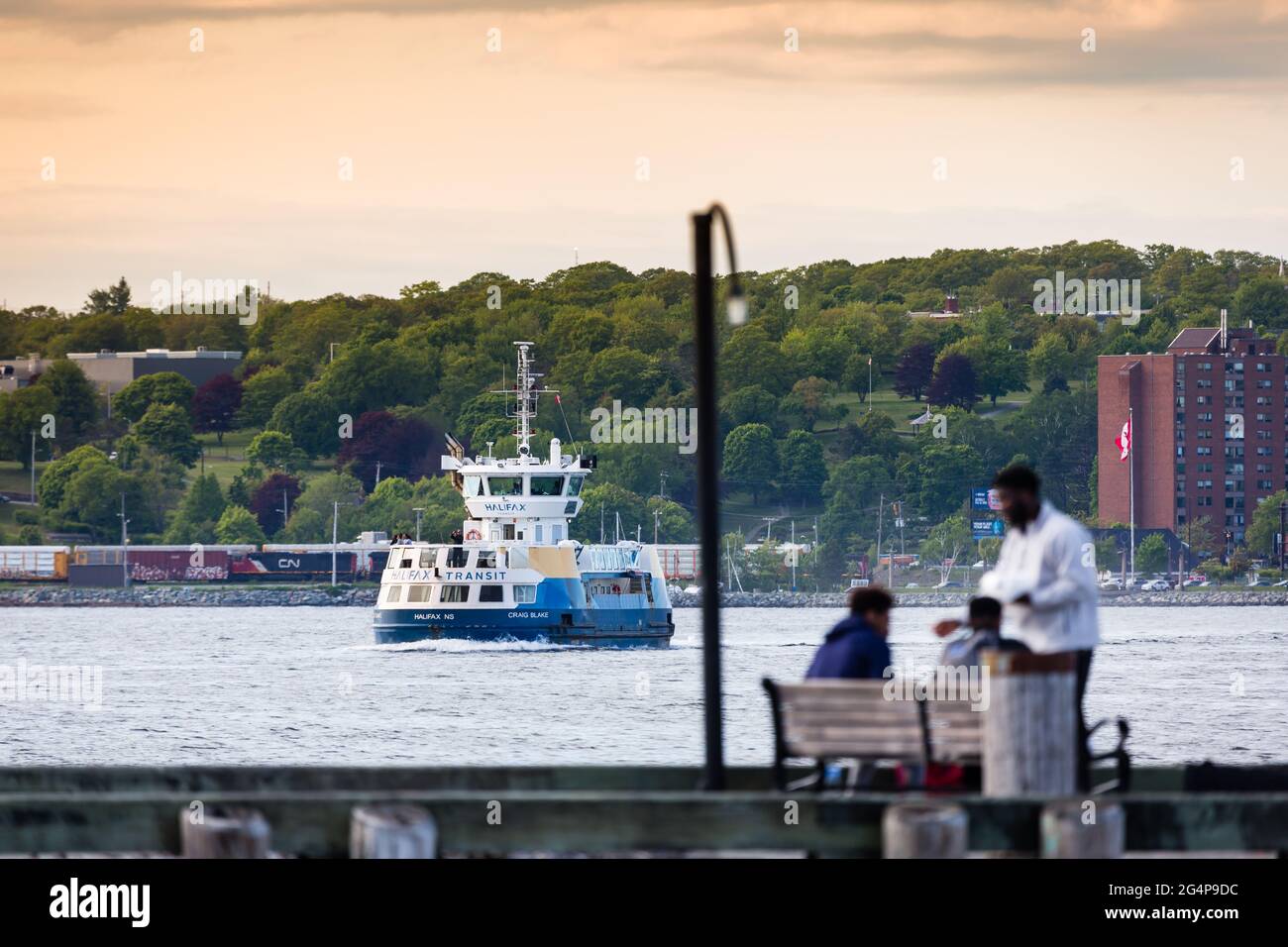 North America's oldest ferry transporting people from Dartmouth to Halifax, Nova Scotia, Canada as seen from the Halifax Harbor front. Stock Photo