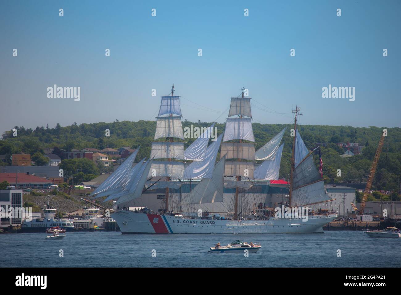 US Coast Guard as Tall ships participating in a parade of sails as part of Rendezvous 2017 in Halifax on Aug. 1, 2017 during the Tall Ships festival Stock Photo