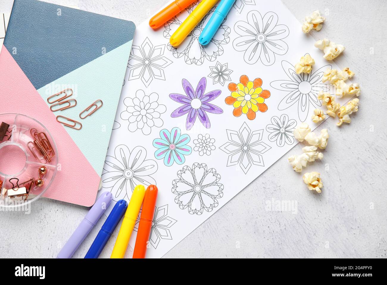 Composition with coloring picture on light background Stock Photo - Alamy