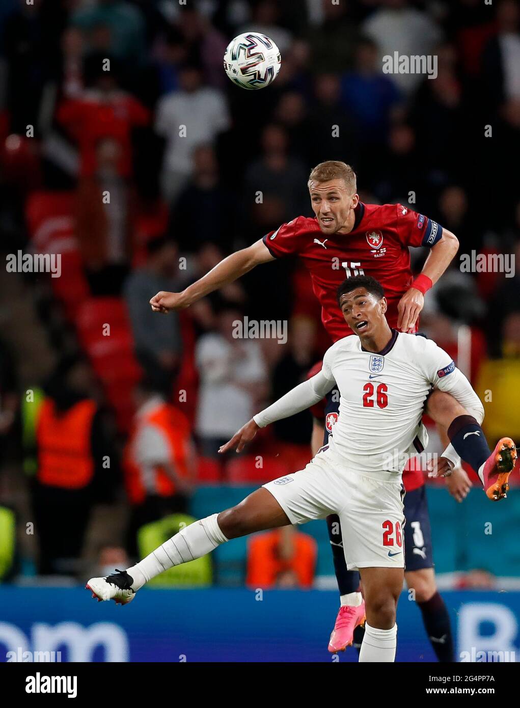 London, Britain. 22nd June, 2021. England's Jude Bellingham (bottom) vies with Czech Republic's Tomas Soucek during the Group D match between England and the Czech Republic at the UEFA EURO 2020 in London, Britain, on June 22, 2021. Credit: Han Yan/Xinhua/Alamy Live News Stock Photo