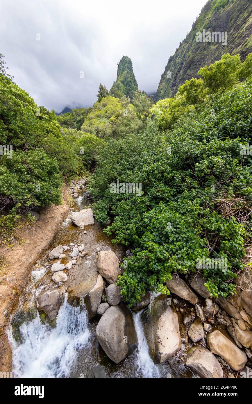 The Maui Iao Needle with Iao Stream in the foreground at Iao Valley State Park, Maui, Hawaii. Stock Photo