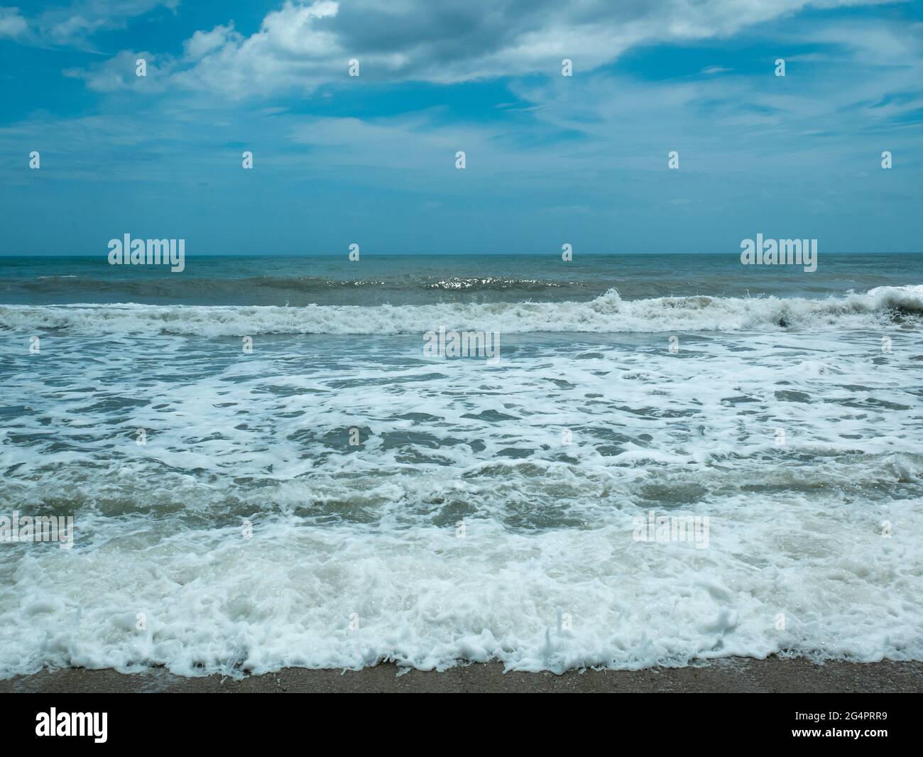 Waves reaching sea coast sunset hi-res stock photography and images - Alamy