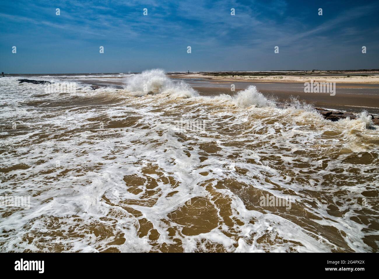 Waves hitting rock breakwater at Matagorda Peninsula near Colorado