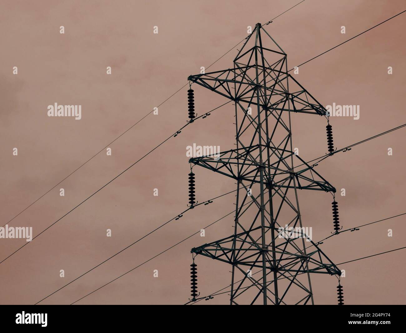 Electric supply tower isolate on sky background, Industrial presentation concept. Stock Photo