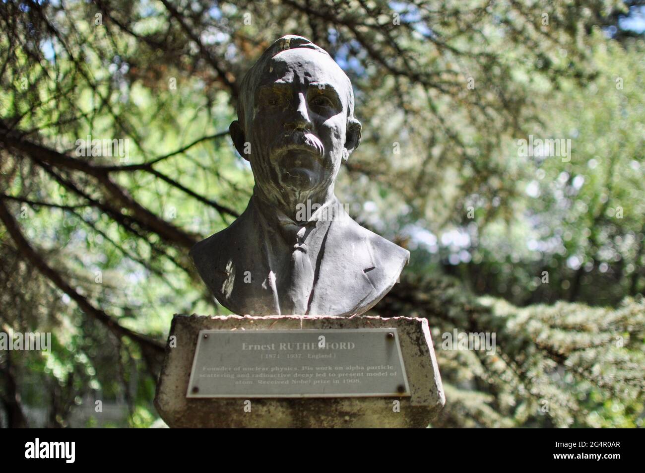 The bronze bust of Ernest Rutherford at METU greenery park. A New Zealand born British physicist, known as the father of nuclear atomic physics Stock Photo