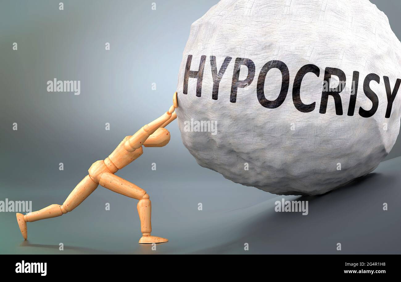 Hypocrisy and painful human condition, pictured as a wooden human figure pushing heavy weight to show how hard it can be to deal with Hypocrisy in hum Stock Photo