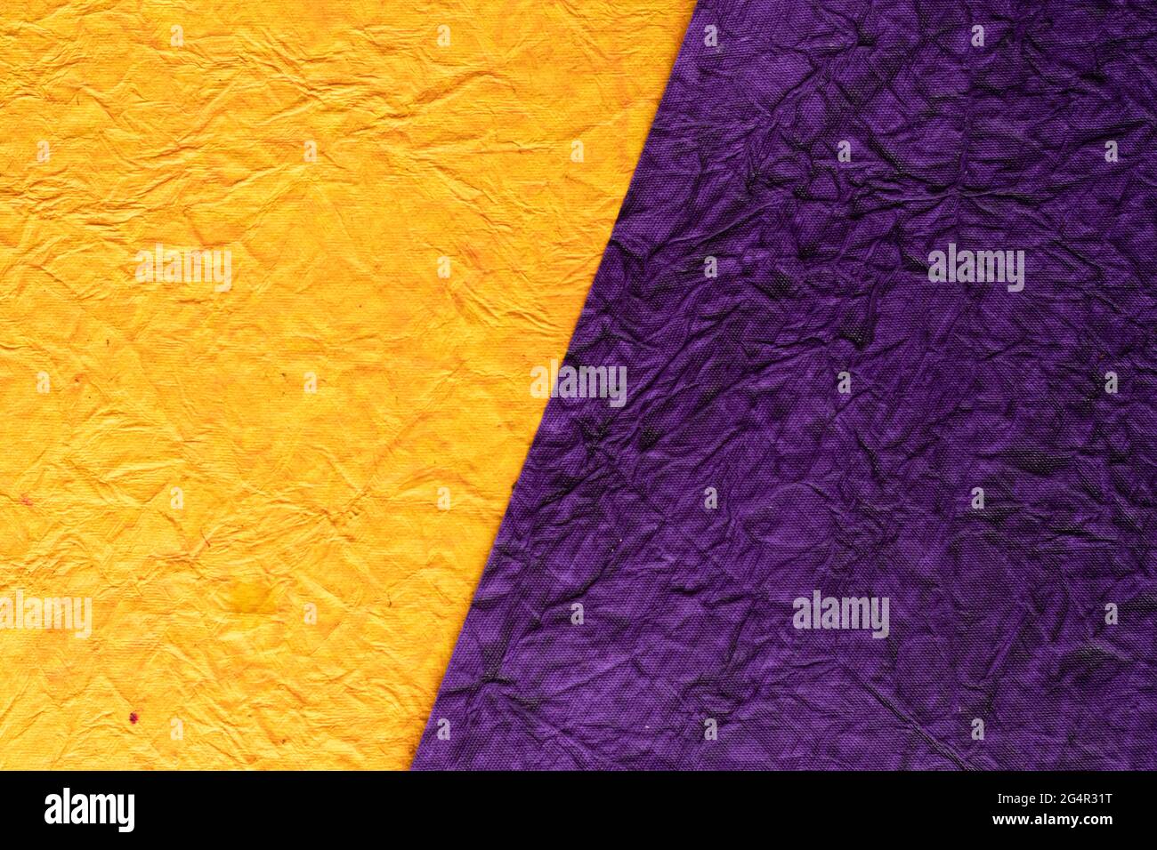 Splited Background with yellow and violet coloured crushed paper Stock ...