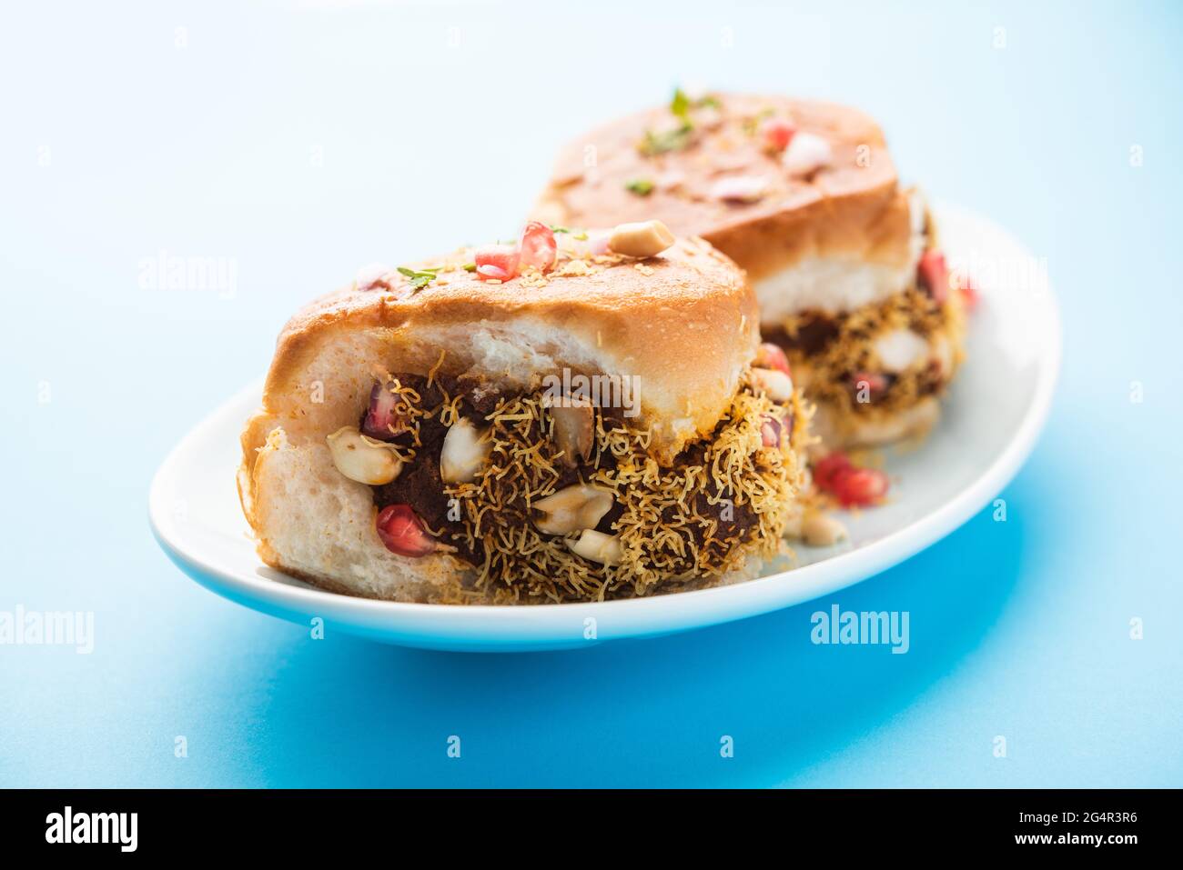 Dabeli, kutchi dabeli or double roti is a popular snack food of India, originating in the Kutch or Kachchh region of Gujarat Stock Photo