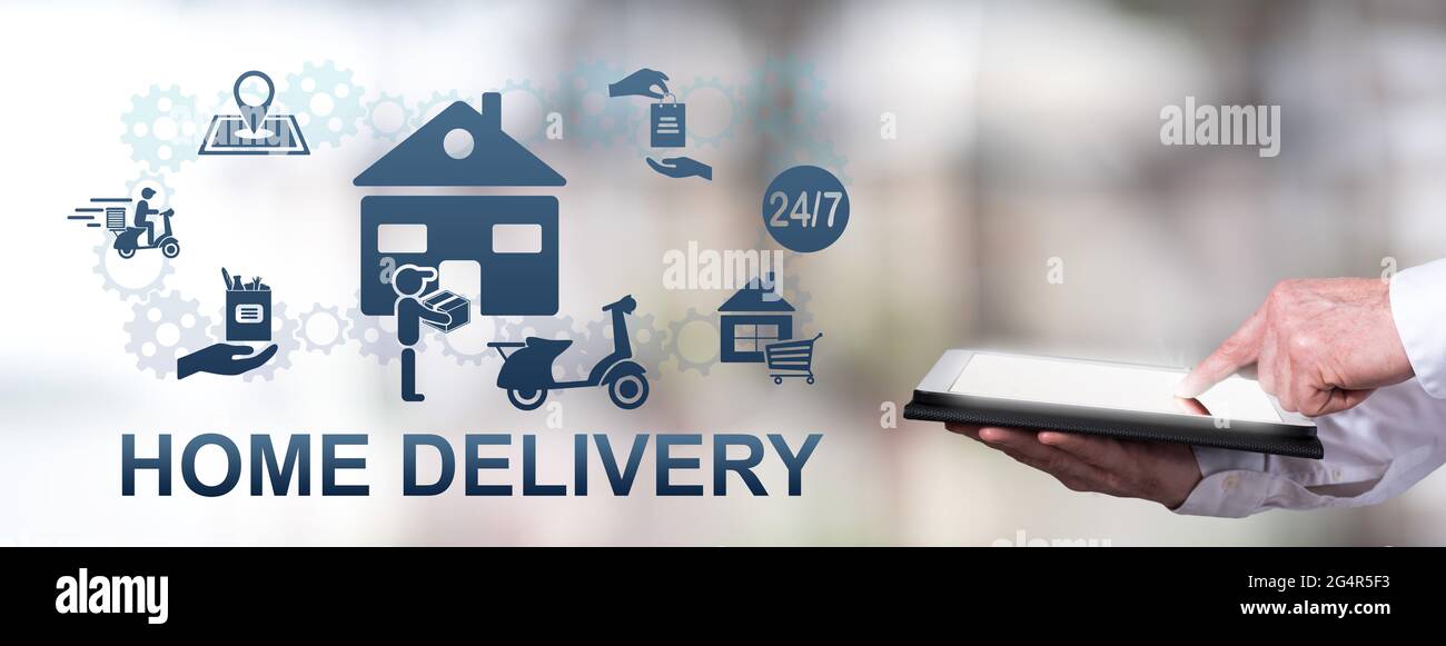 Man using a tablet with home delivery concept Stock Photo