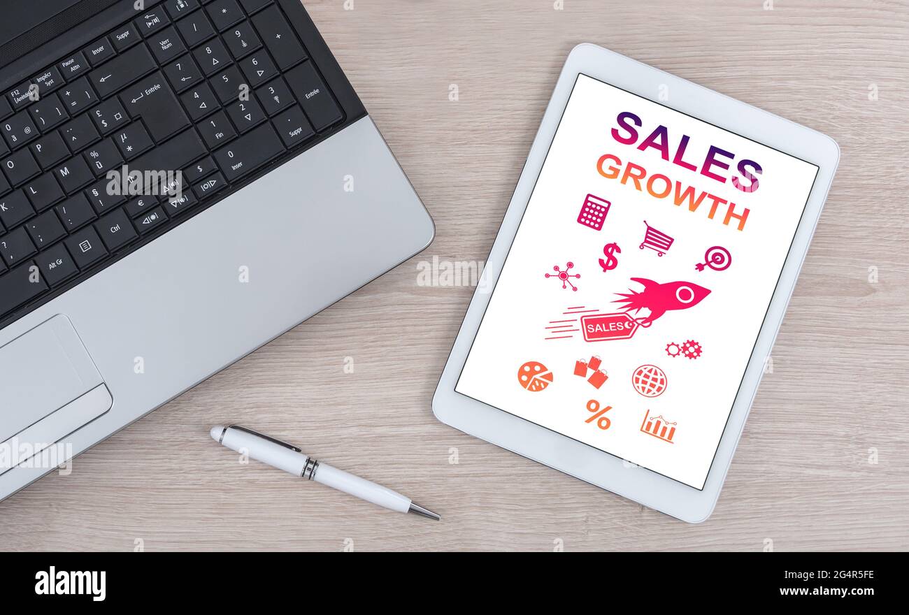 Sales growth concept shown on a digital tablet Stock Photo