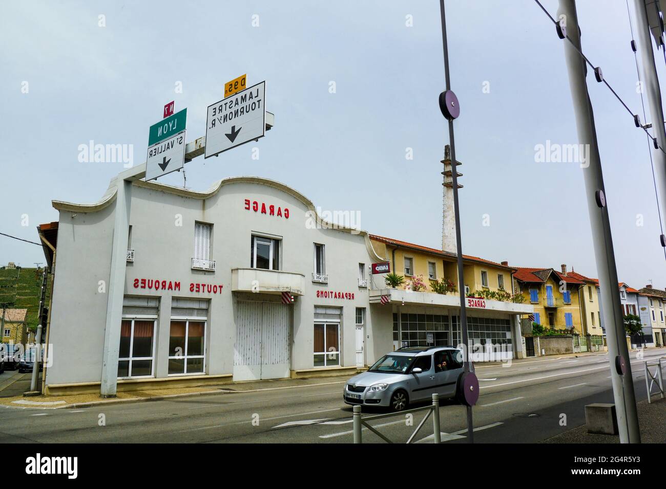 Reflection of a Vintage Gas station located along former RN7, Mythic