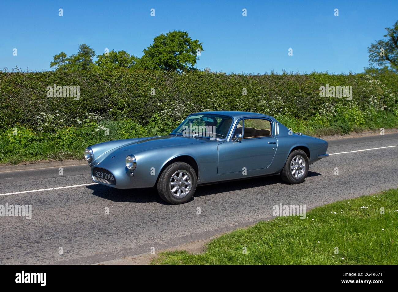 1972 70s Lotus Elan +2 1558cc petrol coupe en-route to Capesthorne Hall classic May car show, Cheshire, UK Stock Photo