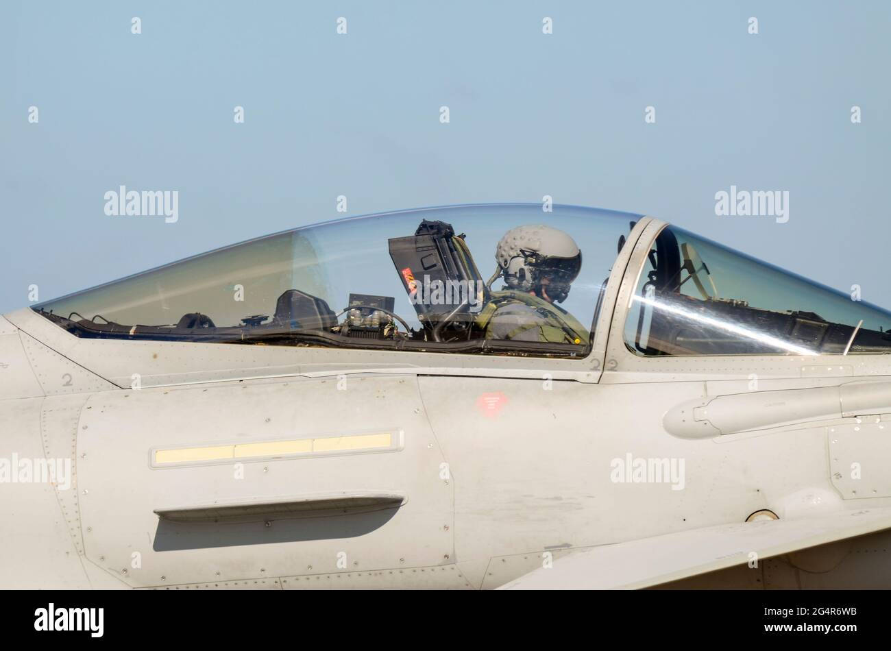 Pilot of a Royal Air Force Eurofighter Typhoon fighter jet plane wearing a special flying helmet. BAE Systems Helmet Mounted Symbology System Stock Photo