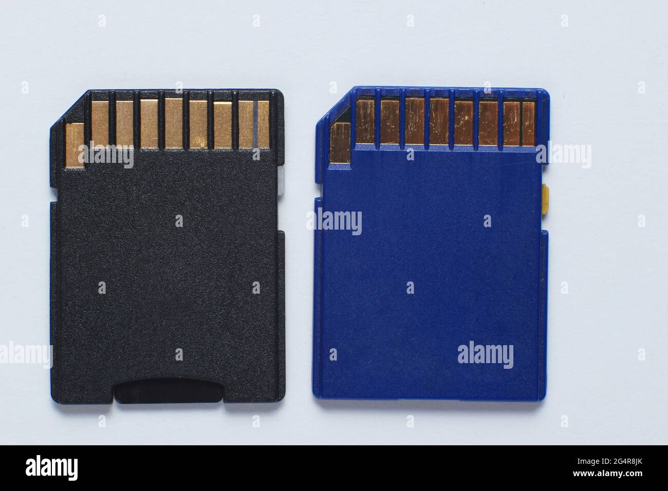 Two Mini SD memory cards on white background close up Stock Photo