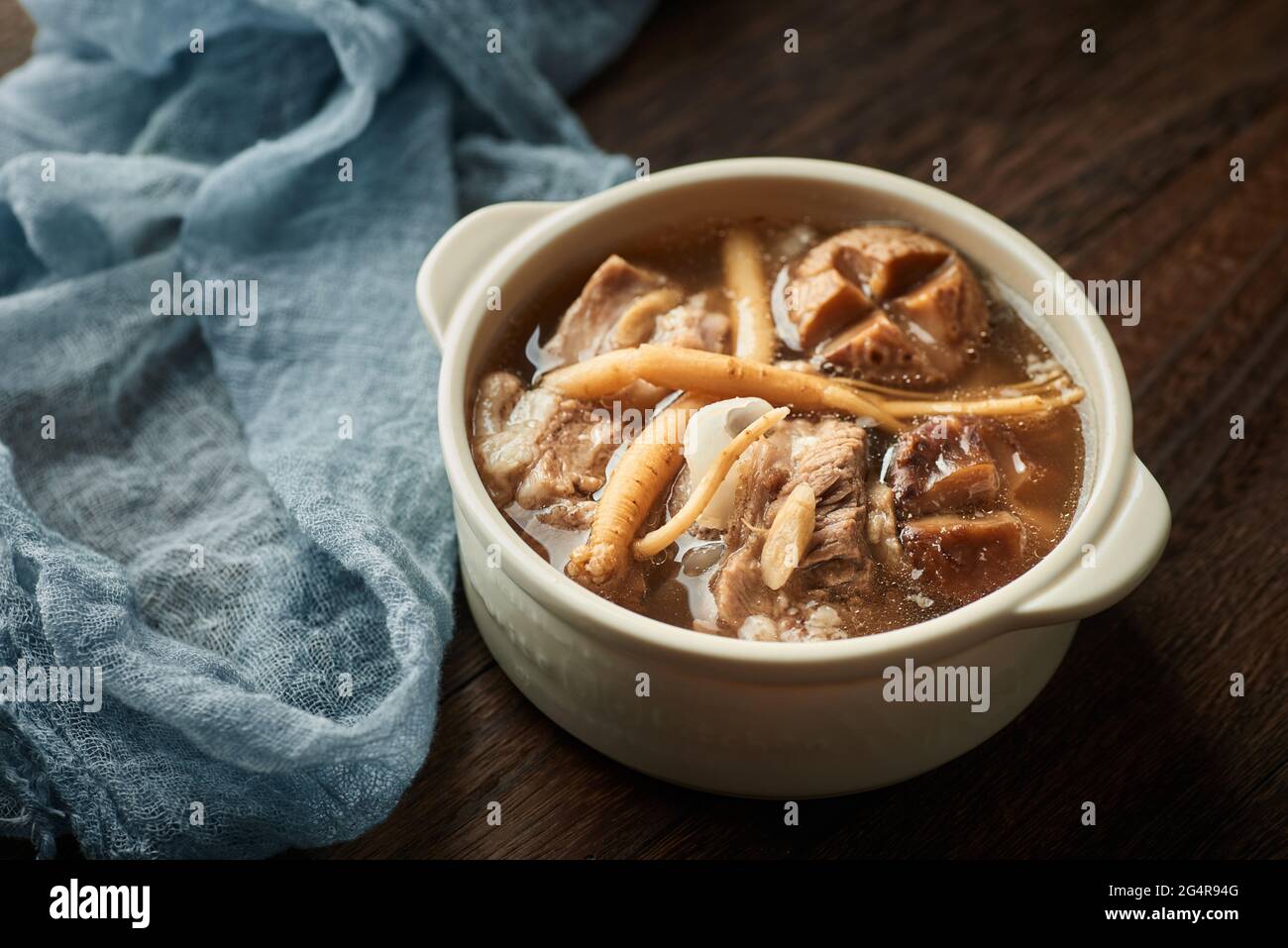Mushrooms and astragalus codonopsis pilosula stewed pig bone soup Stock Photo
