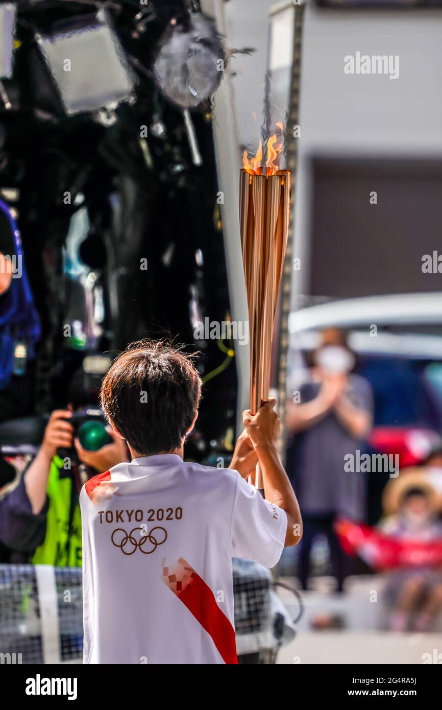A Local Torchbearer Runs During The Tokyo 2020 Olympic Torch Relay In Shiogama City Miyagi Prefecture Japan On June 20 2021 Credit Kosuke Ando Aflo Alamy Live News Stock Photo Alamy