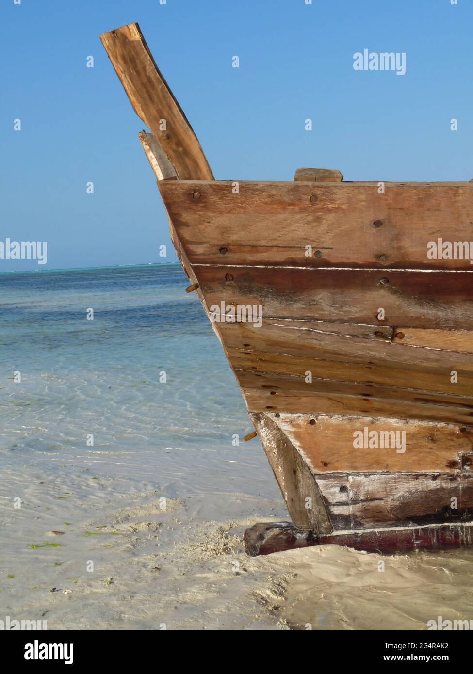 Beached nagalawa boat on Jambiani beach, Zanzibar, ample copy space Stock Photo